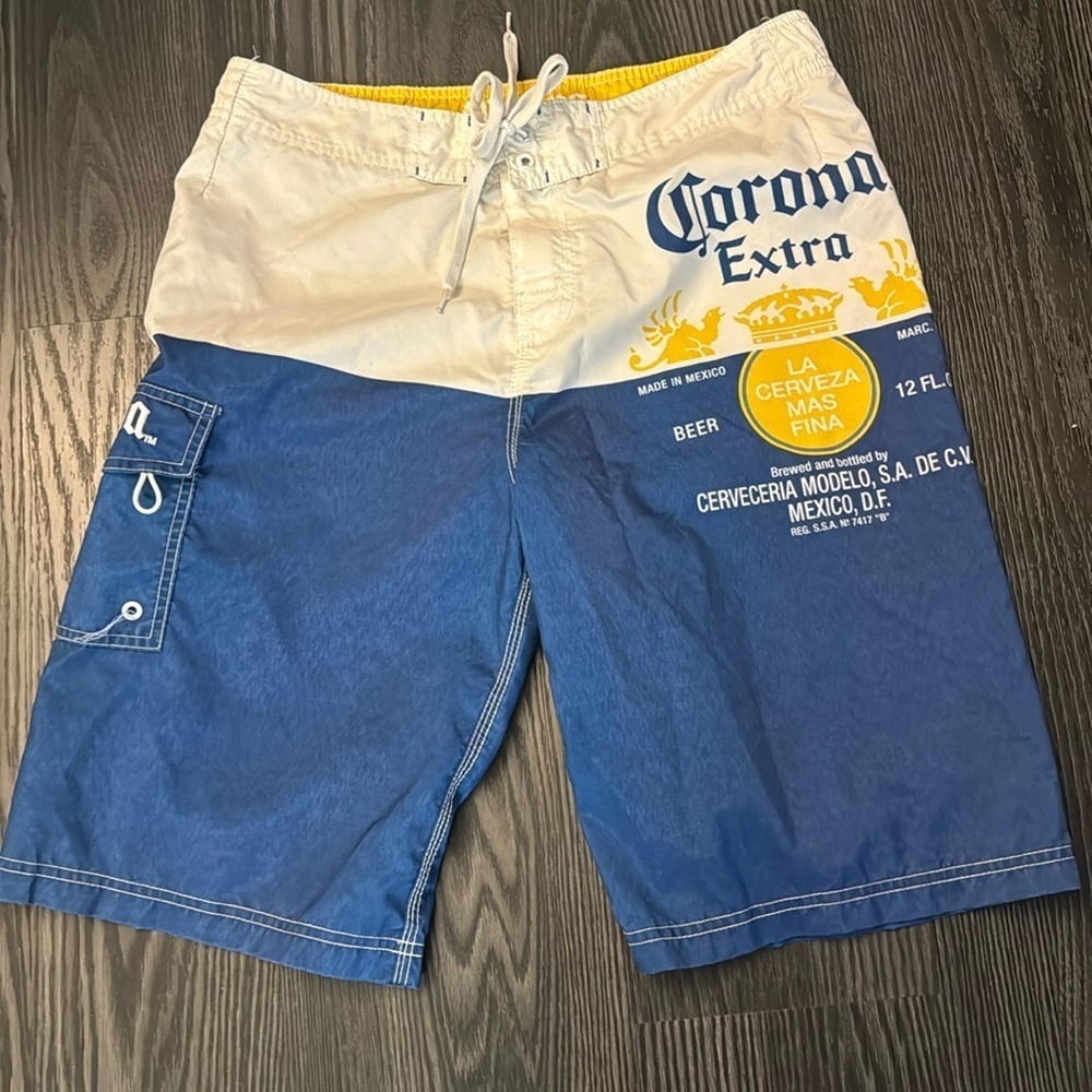 Corona Blue and White Men’s Swim Trunks with Yellow Logo